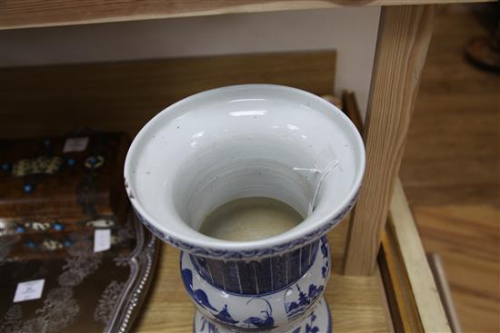 A 19th century Chinese blue and white vase, of Gu form, H. 13in.